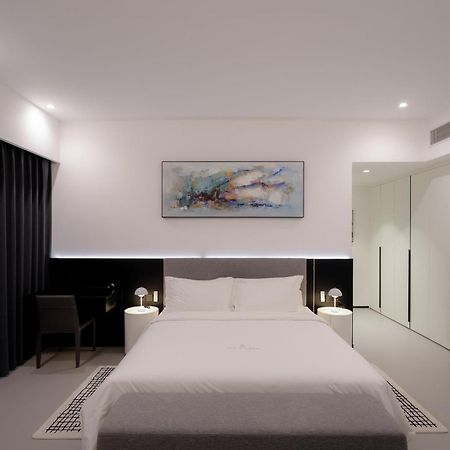 One Riviera Hotel And Residences Ban Souanmone ภายนอก รูปภาพ