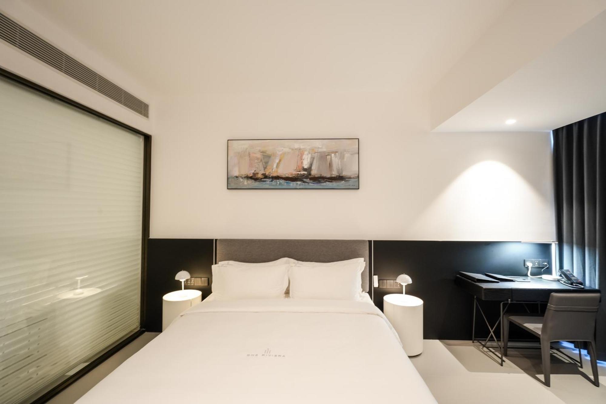 One Riviera Hotel And Residences Ban Souanmone ภายนอก รูปภาพ