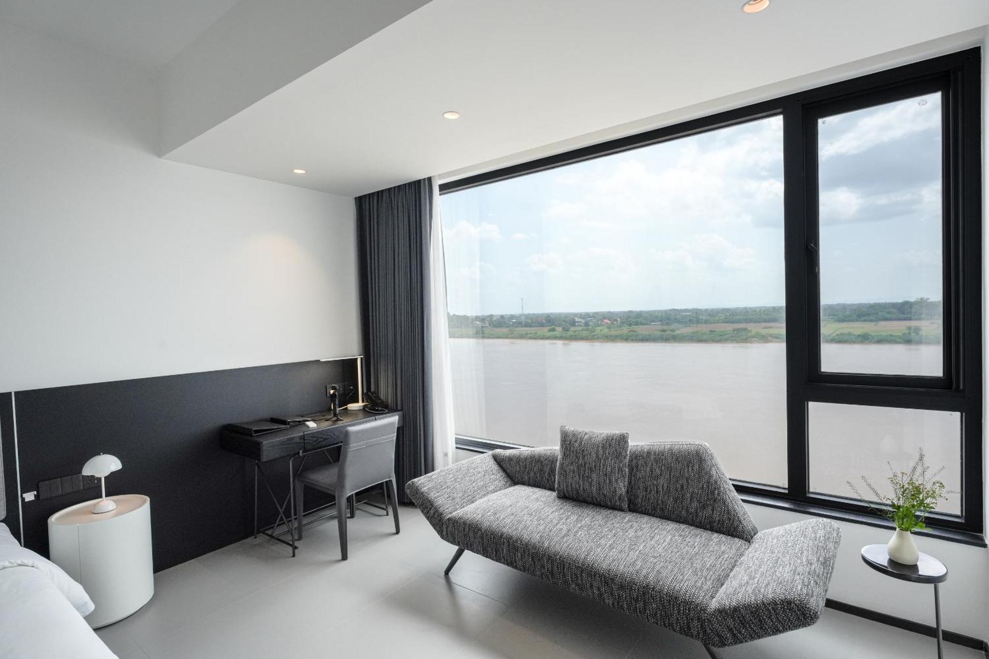 One Riviera Hotel And Residences Ban Souanmone ภายนอก รูปภาพ